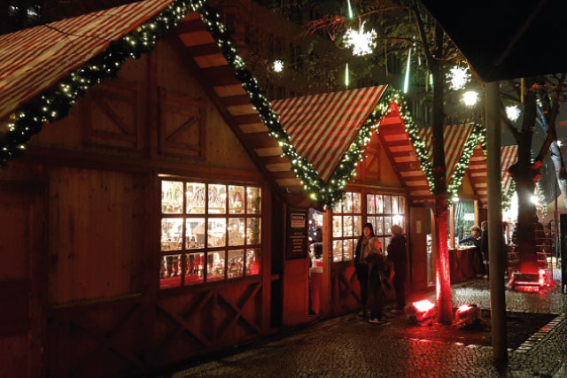 Stalls at the Christmas market of Potsdamer Platz in Berlin.