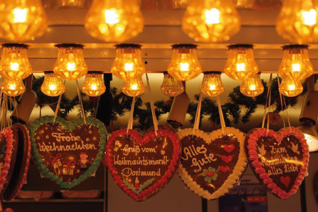 Marzipan hearts on display at a Christmas stall.
