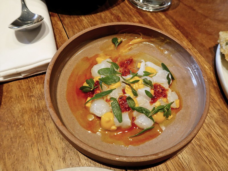 Colorful fish dish served at Levan, one of the most affordable Michelin restaurants in London