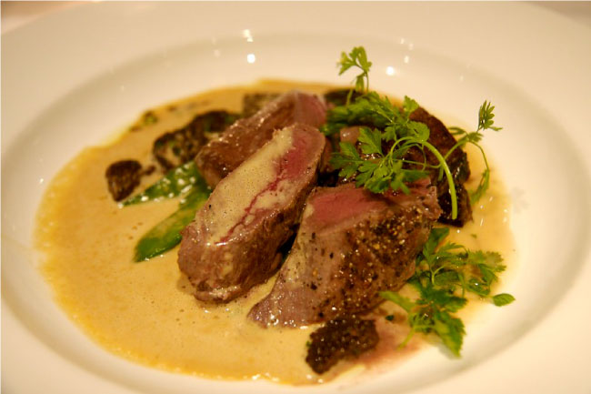 venison dish with foie gras sauce in the Käfer restaurant in the Bundestag in Berlin.