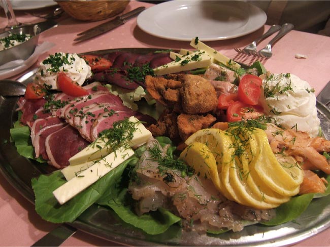 German mixed starters platter in the Marjellchen restaurant in Berlin, Germany.