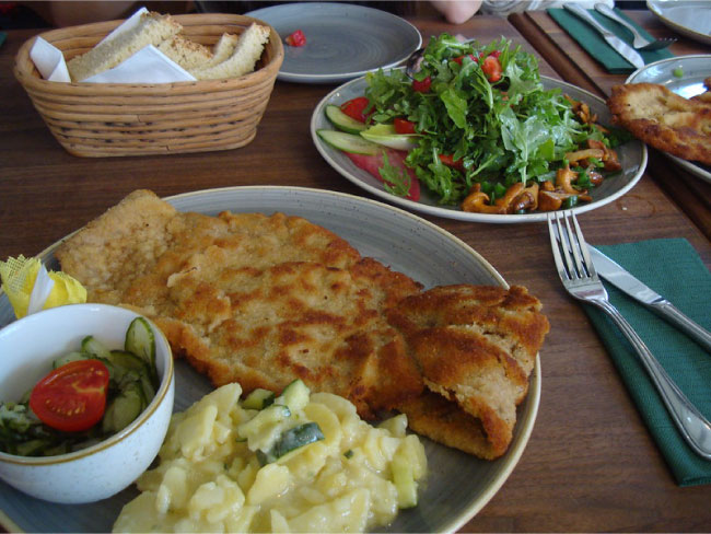 Schnitzel dish with mashed potatoes in the German cuisine restaurant Schnitzelei in Berlin.